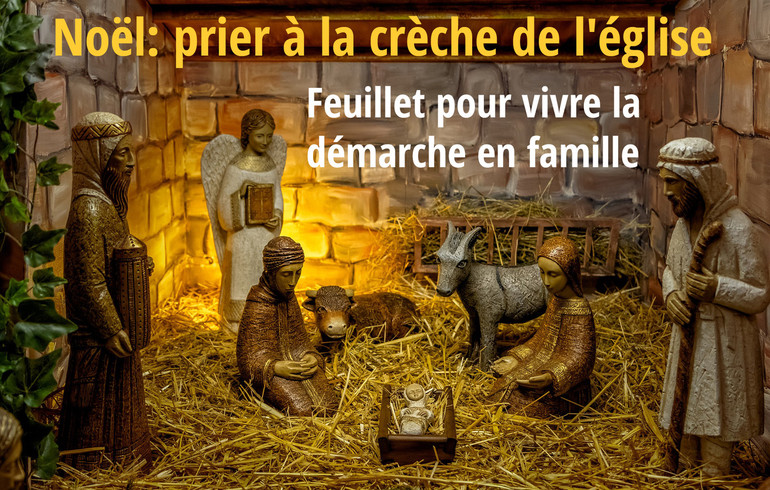 Prier à l'église, devant la crèche